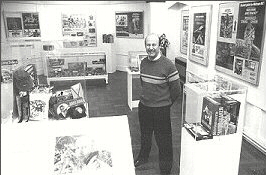 Daryl surrounded by exhibits.